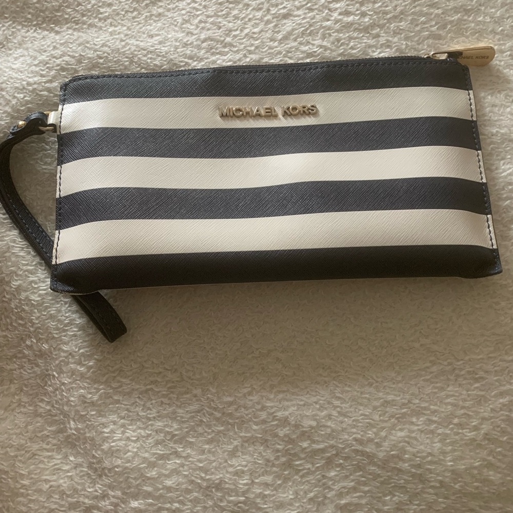 Michael Kors wristlet navy white stripe used